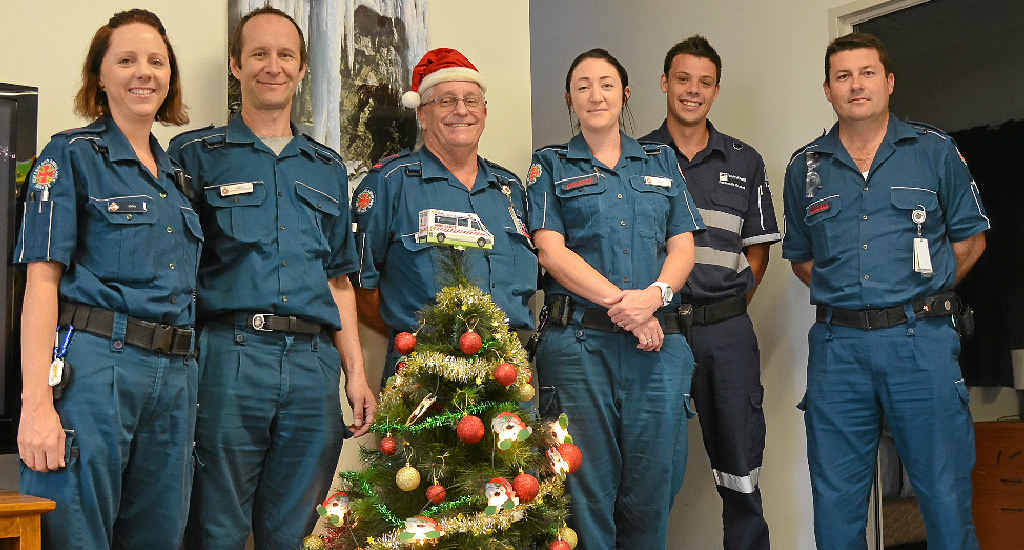 ON DUTY: Working Christmas day will be Warwick paramedics (from left) Anna Bowman, Jason Lockyer, Merv Bray and Kim Underwood, with Queensland University of Technology paramedic student Richard Lang and Warwick Ambulance Station acting officer-in-charge Troy Haley.